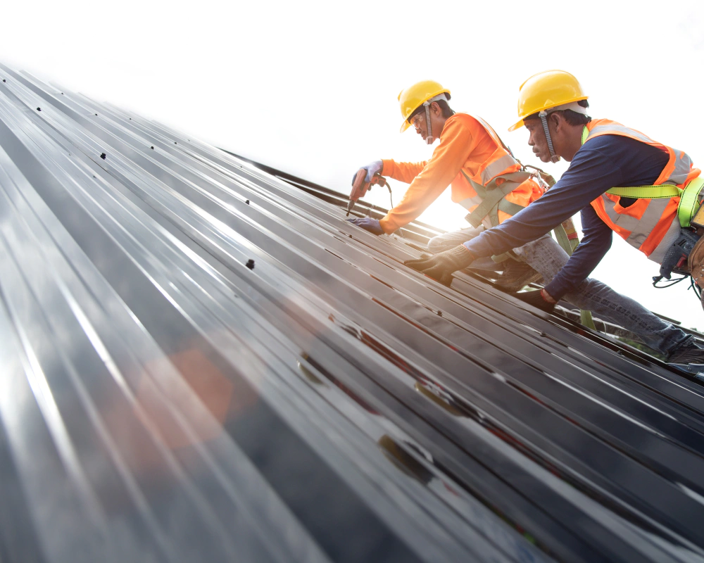 men installing metal commercial roof 1 Worth TX